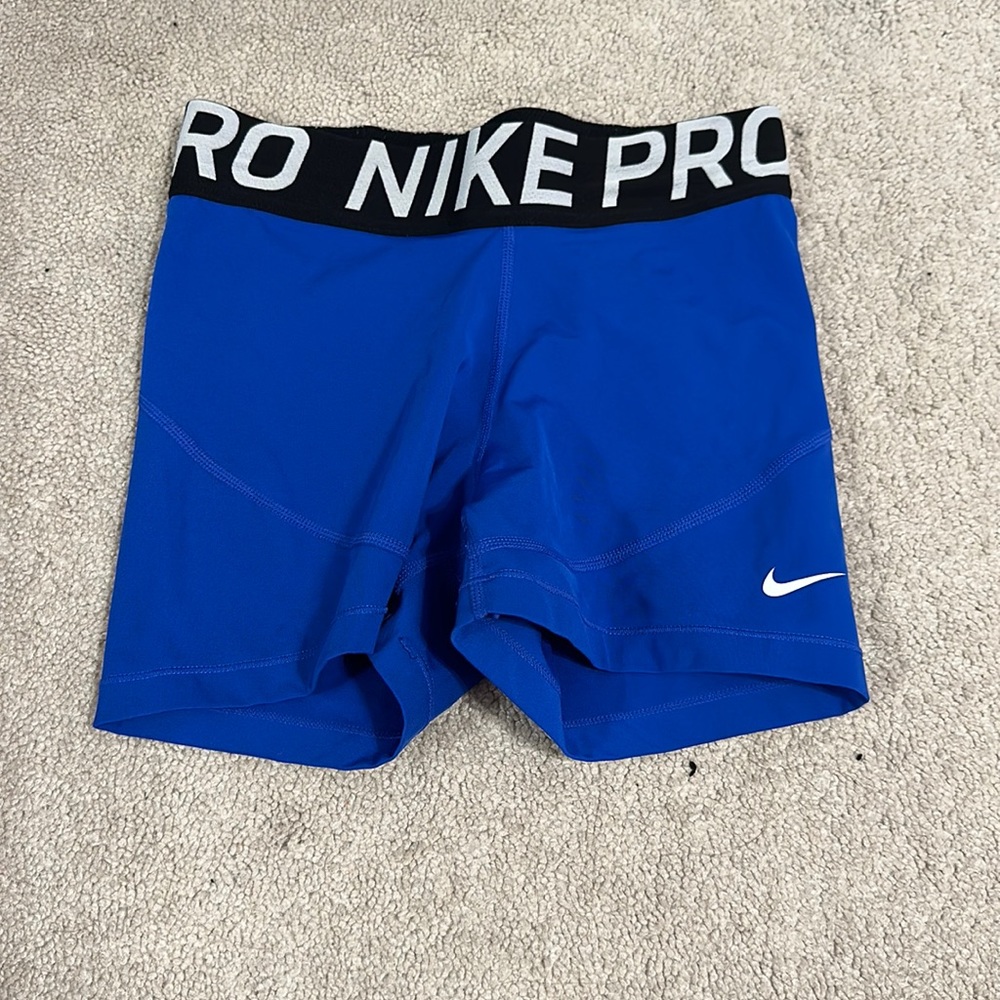 Nike dry-fit nike pros. worn once. in new condition.